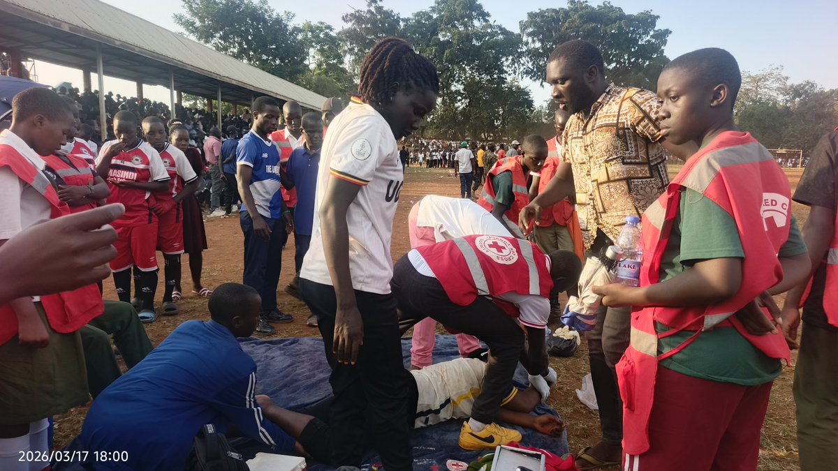 A student being helped by <a href="/RedcrossUganda/">Uganda Redcross</a> team at USSSA football games in Masindi Municipality.  Many questions are arising from football guns “Why can't <a href="/USSSAOnline/">Uganda Secondary Schools Sports Association</a> provide an ambulance during these games?”
Photo by:  Joel Tinka