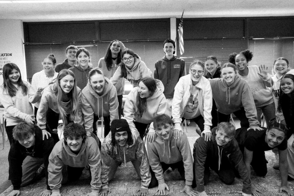 LyonsSchools's tweet photo. Then & Now: 1976 to 2026. Our students brought a piece of Lyons history back to life by recreating a 1976 class photo with the same pose, energy, and plenty of laughter along the way. Once a Lion, always a Lion.
#LYPride #LeadLikeALion #LyonsLegacy #AlwaysALion #NowandThen https://t.co/08n9imbP5c