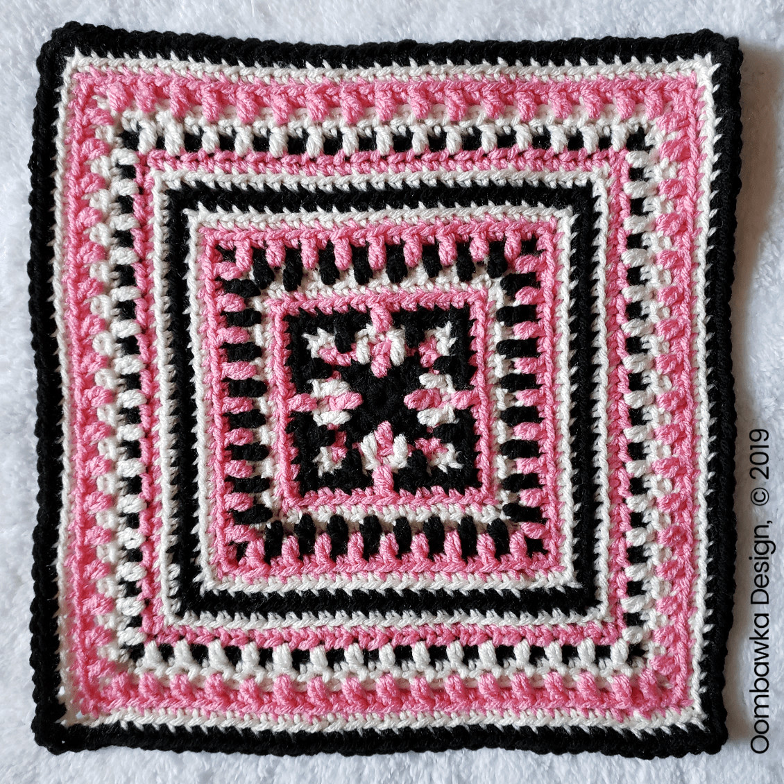 OombawkaDesign's tweet image. The Madison Afghan Square is crocheted with medium weight yarn [4] and a 6 mm (J) hook. This square is easy to crochet! #yarnspirations #mooglycal2019 #redheartyarn #joycreatorshttps://oombawkadesigncrochet.com/2019/10/madison-afghan-square-pattern.html
