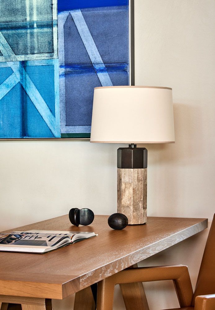 A bold painting by Charles Arnoldi hangs above a Christian Liaigre desk and an Alexander Lamont lamp in the keeping room of this DW-designed project, STRATA. 

Follow the link >> bit.ly/3ZXI5yN
