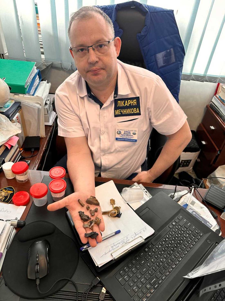 BWarzy's tweet photo. Day 24 โ Andriy
He's the head of neurosurgery 60 miles from the front. He keeps a bag of shrapnel he's removed from soldiers' brains and pours it on his desk for visitors. 2000 war surgeries since 2014. "War is random." Day 24 of 40. Donate:https://t.co/kxSbWEb6os #Ukraine #Razom https://t.co/bpzEX2cE6k