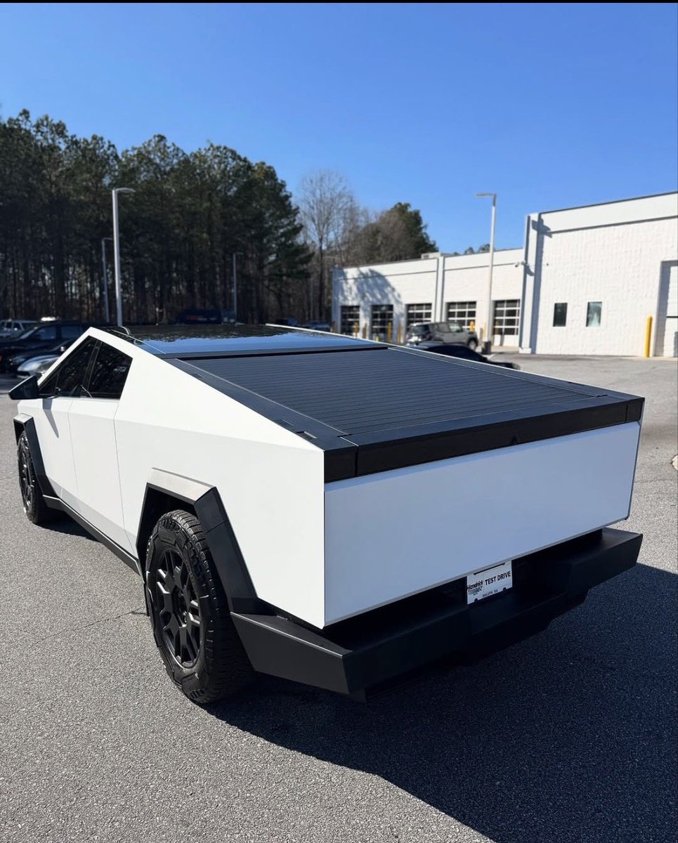 just_quez's tweet photo. Turned crypto gains into real life wins. Cashed out yesterday, and today I'm pulling up in a brand-new Tesla Cybertruck. Proof that consistency, patience, and focus pay off. Big appreciation to my coach @thedigitalgur for the guidance and support every step of the way https://t.co/uCauhjEPk8