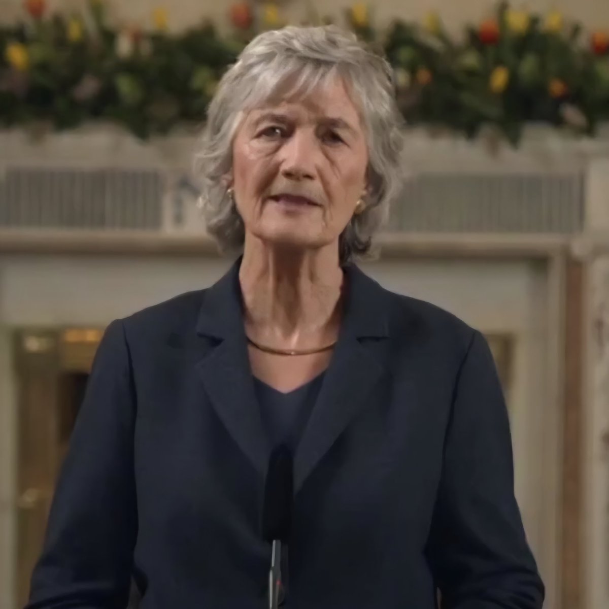 A British Monarch looking more festive than our Irish Socialist President on St. Patrick's Day.