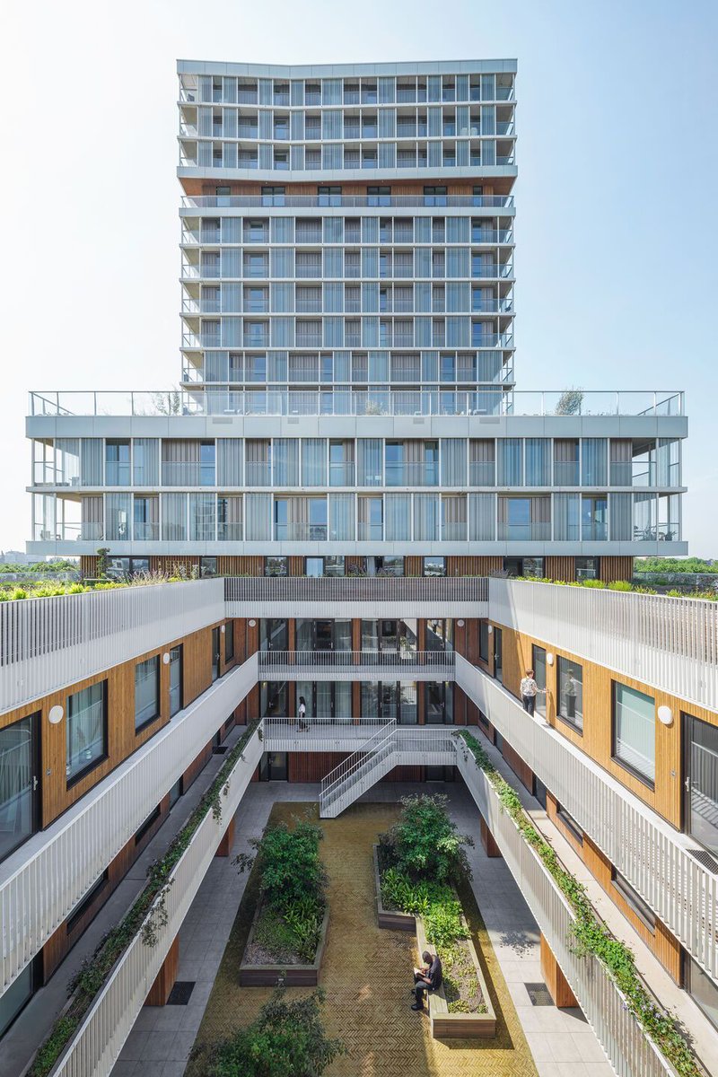 Archello's tweet photo. Floating Gardens by @orange_arch layers housing, an all-in-one school, and shared spaces into a mixed-use structure in Amsterdam.
https://t.co/21kRc8bDfv
#TimberFacade #GreenRoofDesign #MixedUseArchitecture https://t.co/WGP7G6pPNj