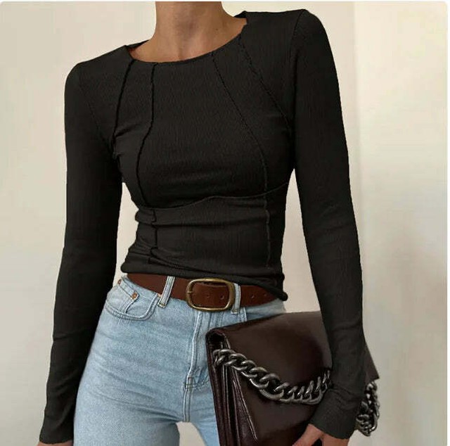 umlegacypress's tweet image. Elevate your wardrobe with timeless sophistication. ✨ Discover the Slim Long Sleeve T-shirt in a luxurious solid color, featuring intricate split-thread knitting that adds depth and… dlvr.it/TRYfPR #LuxuryFashion #InvestInStyle #WardrobeEssentials #ChicStaples