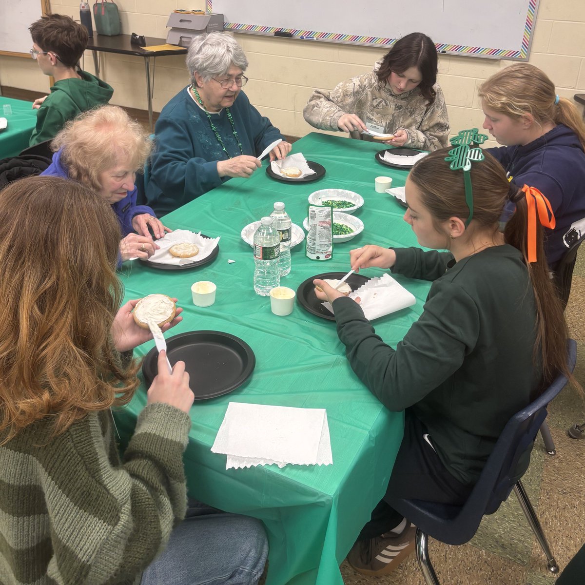 TimberlaneMS's tweet photo. Student Senate and Vic Geary Senior Citizens celebrated St. Patrick’s Day together by decorating cookies and playing bingo! Lucky winners got to take home a pot of gold! The groups enjoy sharing stories and laughs together. It’s always a great time hosting our senior buddies! https://t.co/jGWz90mbkN