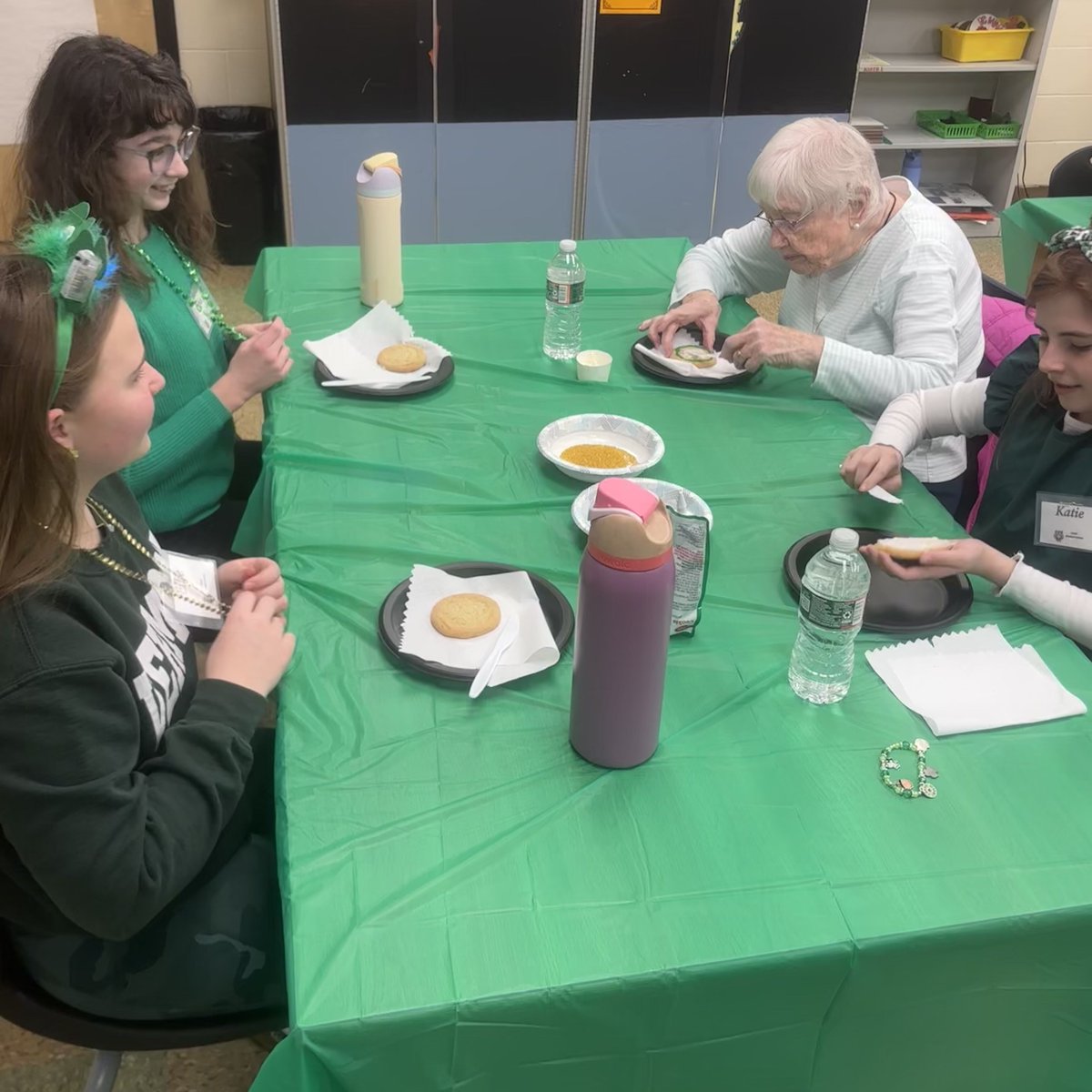 TimberlaneMS's tweet photo. Student Senate and Vic Geary Senior Citizens celebrated St. Patrick’s Day together by decorating cookies and playing bingo! Lucky winners got to take home a pot of gold! The groups enjoy sharing stories and laughs together. It’s always a great time hosting our senior buddies! https://t.co/jGWz90mbkN
