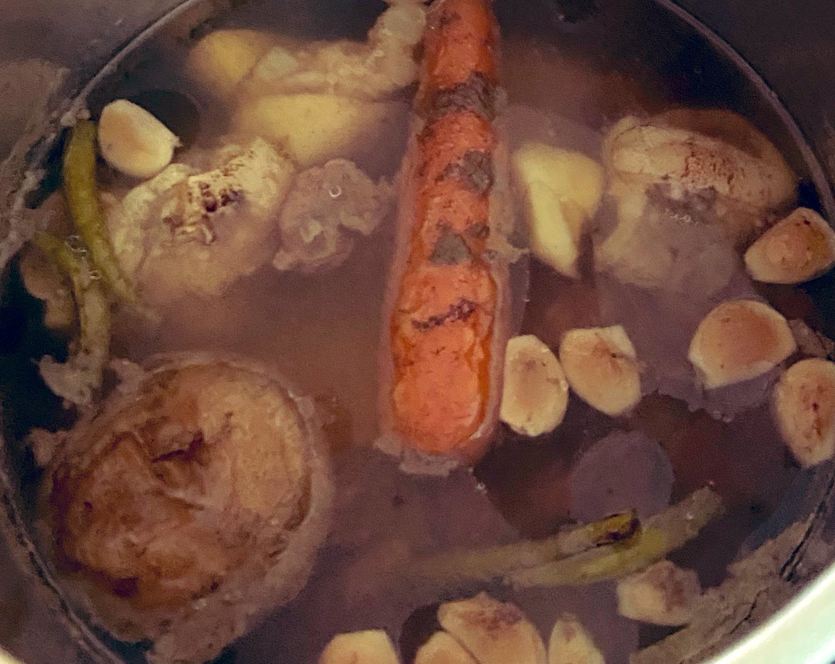 RayPeatHeadShop's tweet photo. The foot broth.

Added a whole onion, carrot, and bulb of garlic — all with skins on (for quercetin and apparently carrot tops are very nutritious, although I prefer not to eat any of the cooked veggies).

I also added green chilies for vitamin C and a bit of heat. Ginger of course. Some other beef cuts I had lying around.

Jelly in the fridge. The feet themselves have a gelatinous rind that you can remove with a fork and eat straight. It’s very soft and tastes neutral.

Broth can then be strained and consumed as a beverage, and it can also be used to boil rice, mash potatoes, make sauces, and simmer basically everything from onions to liver to mushrooms.

Sorry not a very appetizing pic. I made this a week ago and sent photo to friend. Still have a good amount of broth left it has a very long shelf life.