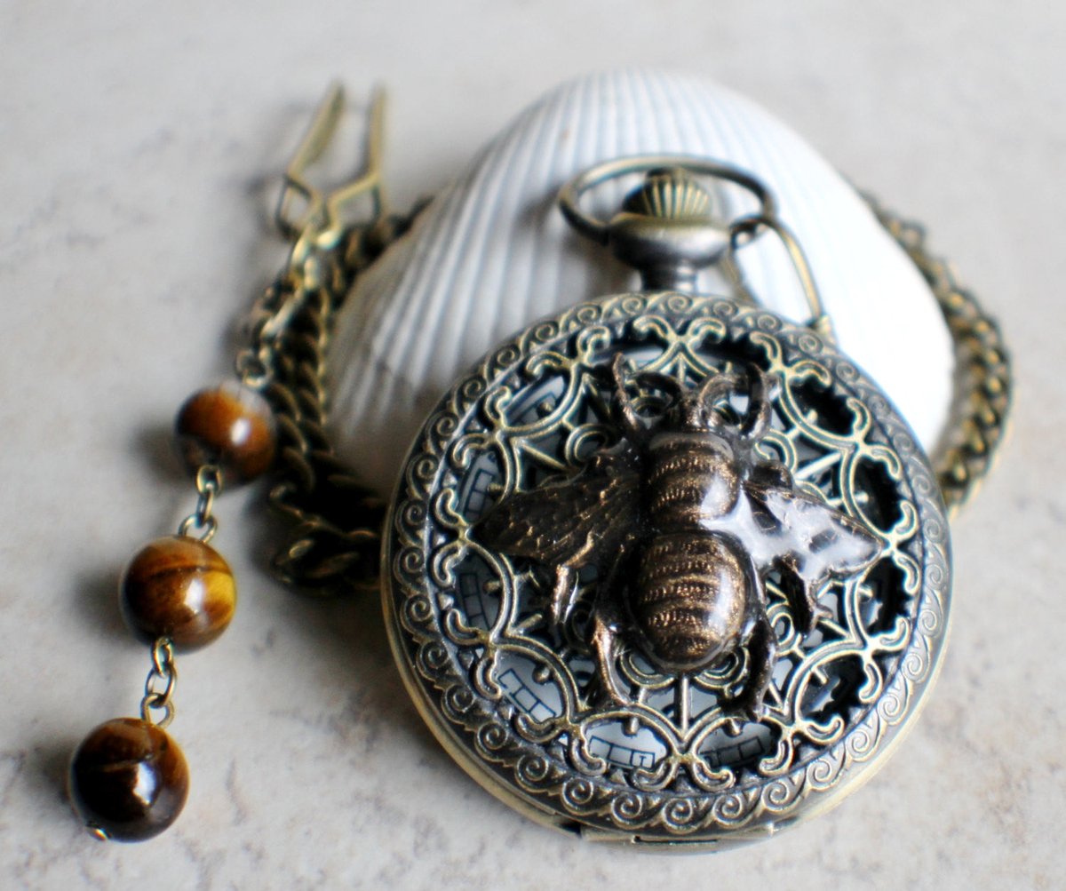 charsfavorite's tweet image. Timeless elegance awaits with our Bumble Bee Pocket Watch, adorned with stunning tiger eye beads. Elevate your style for just $55.00 today! #MensAccessories #LuxuryTimepieces

Shop Now charsfavoritethings.com/products/bumbl…