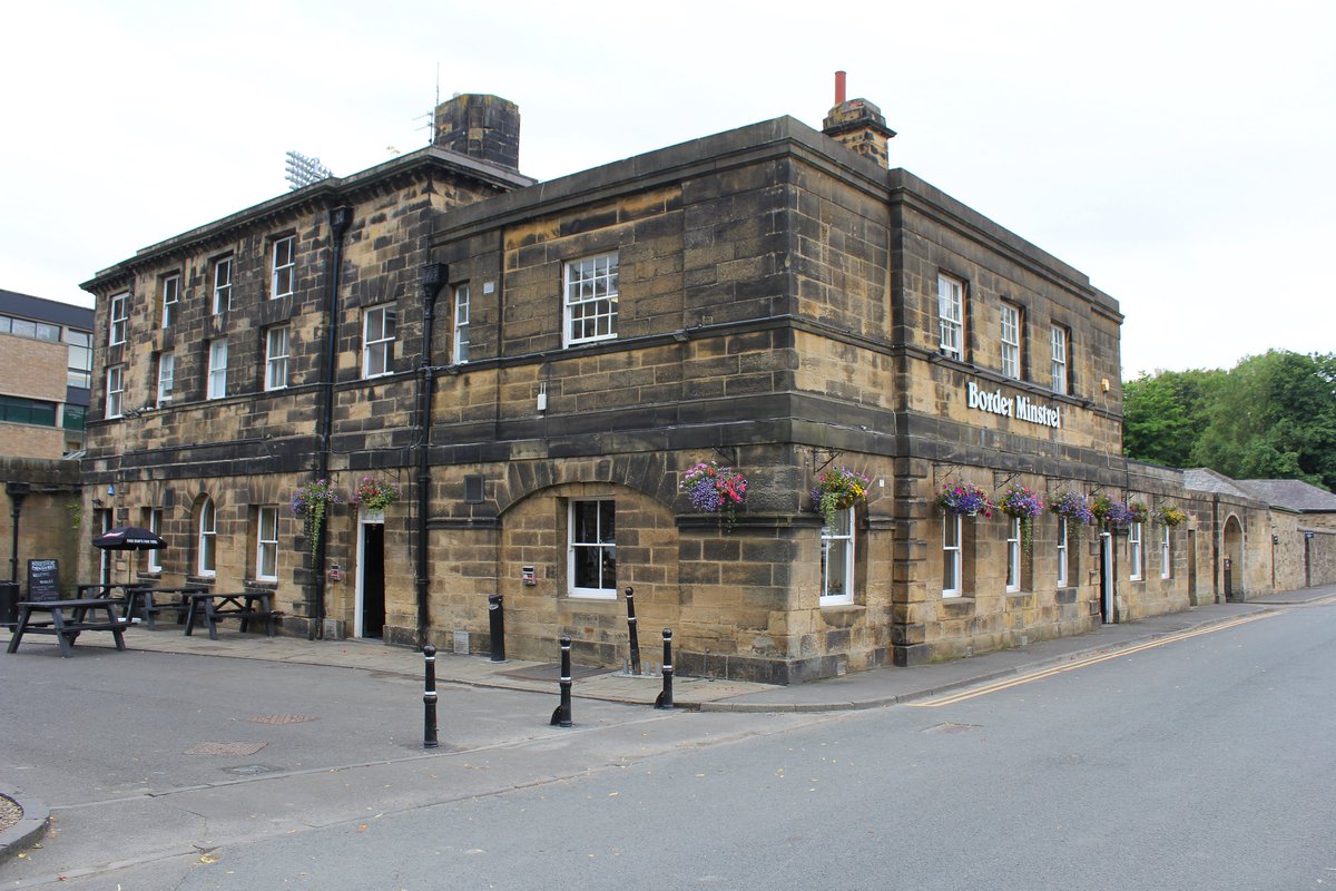 TyneSnapper's tweet photo. #NewcastleUponTyne #Gosforth The Border Minstrel - Gosforth Park Newcastle upon Tyne.

Photographed 28th July 2023.

Named in honour of the winner of the 1927 Pitman’s Derby, the Border Minstrel.
Originally the west pavilion of Brandling House, initially known as Gosforth House was completed in 1764. It was designed by architect, James Paine and owned by local businessman, Charles Brandling.

This was the Original Gosforth Park Hotel and was licenced in 1881.

Grade II* Listed:

NZ 27 SW NORTH GOSFORTH B.1318 (east side) Gosforth Park 4/55 27 August 1952 Border Minstrel P.H. to north west of Brandling House. G.V. II* Ancillary pavilion to country house, now public house. Dated 1757 on rainwater head. By James Paine for Charles and Elizabeth Brandling (CBE on rainwater head). Sandstone ashlar with plinth. Welsh slate roof. 3 storeys, 5 bays and right coach house extension of 2 lower storeys and one bay. Rusticated quoins to central 3 bays; 4-panel double doors in outer bays with overlight at right; central 3 bays project slightly and have central round-headed window flanked by windows in plain reveals; 5 windows on first floor and 4 on second; all windows sashes with glazing bars of late C19 type and voussoirs. First floor band; dentilled eaves cornice. Hipped roof has central chimney with canted corners. One-bay, 2-storey right extension with panelled impost band to blocked segmental arch, has inserted ground floor sash and first floor sash in recessed panel; first floor sill string. Parapet to hipped roof with central banded chimney.

Advert Journal 22nd October 1970.