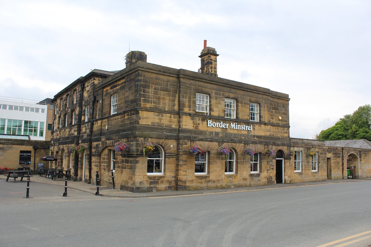 TyneSnapper's tweet photo. #NewcastleUponTyne #Gosforth The Border Minstrel - Gosforth Park Newcastle upon Tyne.

Photographed 28th July 2023.

Named in honour of the winner of the 1927 Pitman’s Derby, the Border Minstrel.
Originally the west pavilion of Brandling House, initially known as Gosforth House was completed in 1764. It was designed by architect, James Paine and owned by local businessman, Charles Brandling.

This was the Original Gosforth Park Hotel and was licenced in 1881.

Grade II* Listed:

NZ 27 SW NORTH GOSFORTH B.1318 (east side) Gosforth Park 4/55 27 August 1952 Border Minstrel P.H. to north west of Brandling House. G.V. II* Ancillary pavilion to country house, now public house. Dated 1757 on rainwater head. By James Paine for Charles and Elizabeth Brandling (CBE on rainwater head). Sandstone ashlar with plinth. Welsh slate roof. 3 storeys, 5 bays and right coach house extension of 2 lower storeys and one bay. Rusticated quoins to central 3 bays; 4-panel double doors in outer bays with overlight at right; central 3 bays project slightly and have central round-headed window flanked by windows in plain reveals; 5 windows on first floor and 4 on second; all windows sashes with glazing bars of late C19 type and voussoirs. First floor band; dentilled eaves cornice. Hipped roof has central chimney with canted corners. One-bay, 2-storey right extension with panelled impost band to blocked segmental arch, has inserted ground floor sash and first floor sash in recessed panel; first floor sill string. Parapet to hipped roof with central banded chimney.

Advert Journal 22nd October 1970.