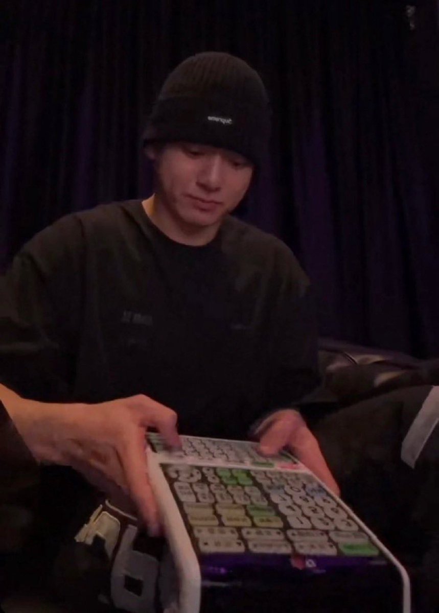 why is jungkook dressed like his karaoke remote he does not need all those buttons
