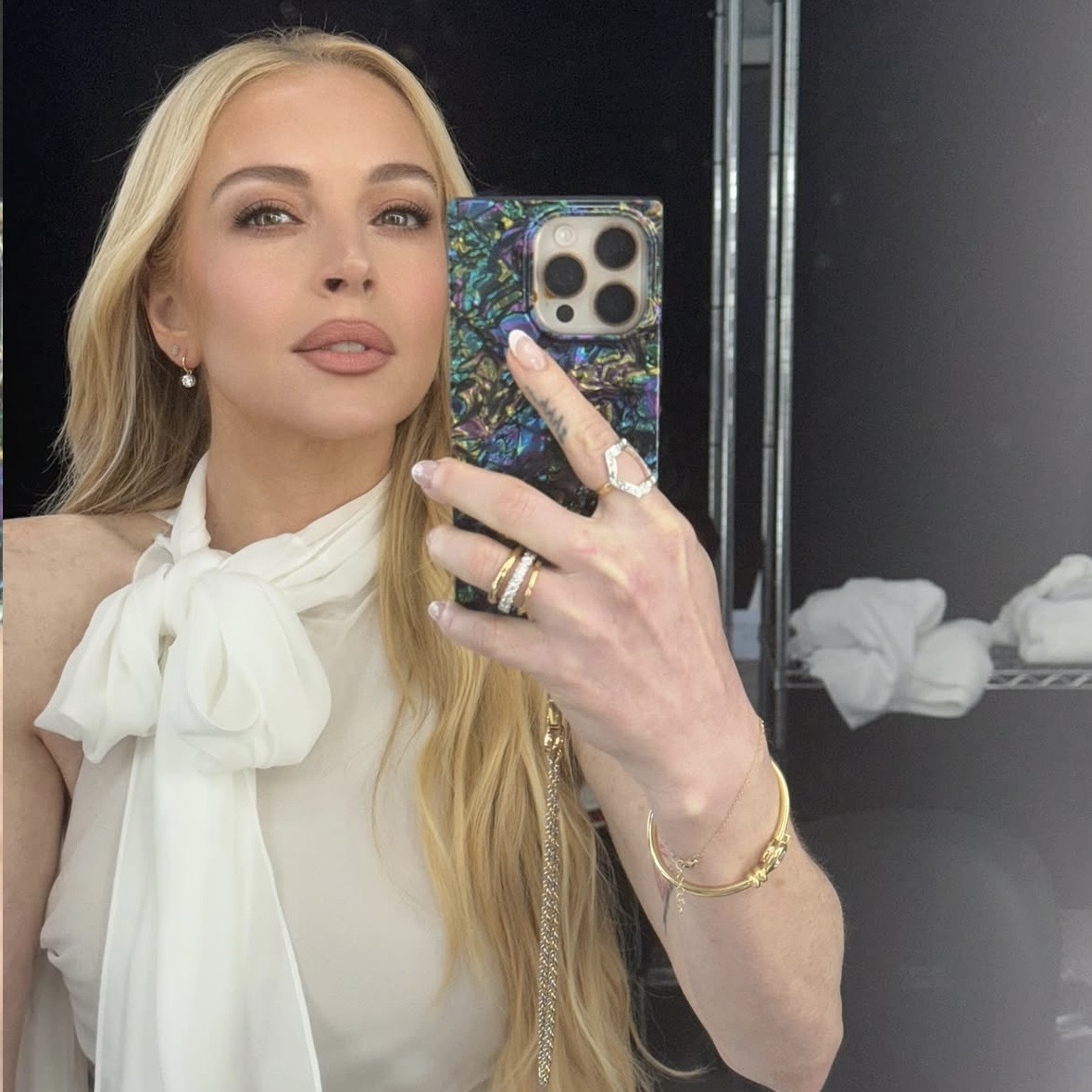 Totally Iconic 💙💜✨ Babe <a href="/lindsaylohan/">Lindsay Lohan</a> w/ our SQUARE® Abalone Shell case &amp; Two-Tone Gold and Silver Rope Chain phone charm! If you’ve got it…#FLAUNTit #ProtectinStyle #FLAUNTcases