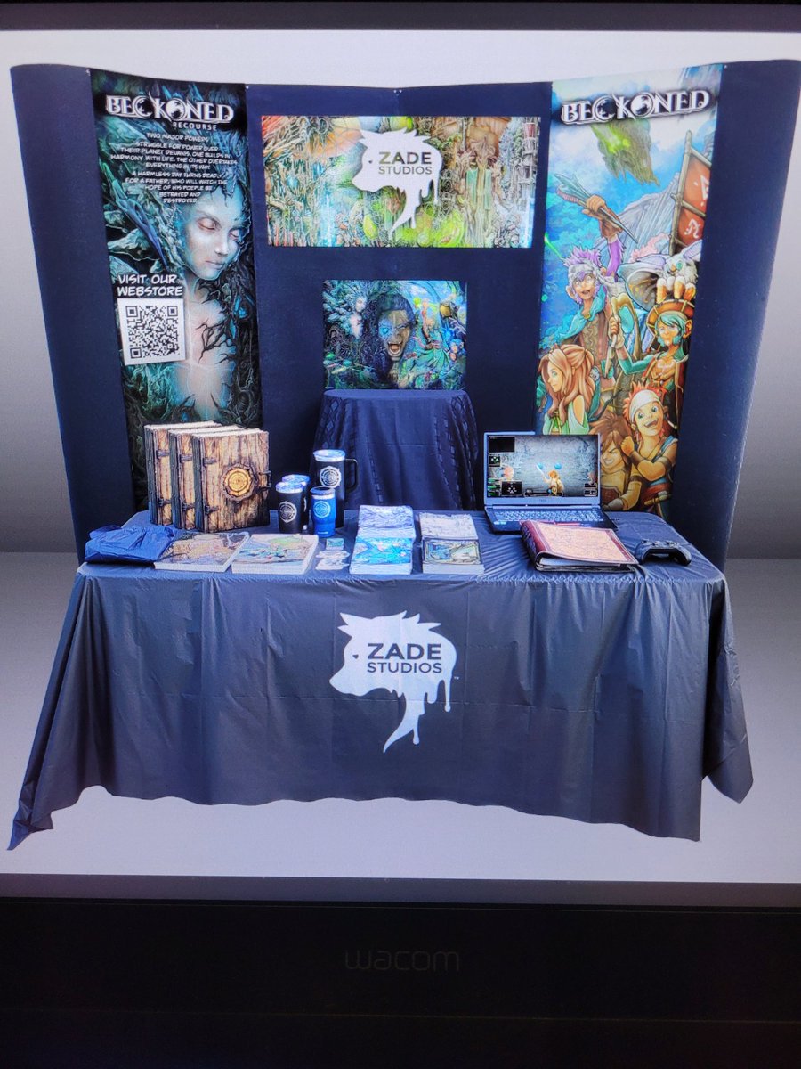 A concept of our con-booth design.
Banner images changed a bit, but everything is in now, so it's time to do a test set-up soon.