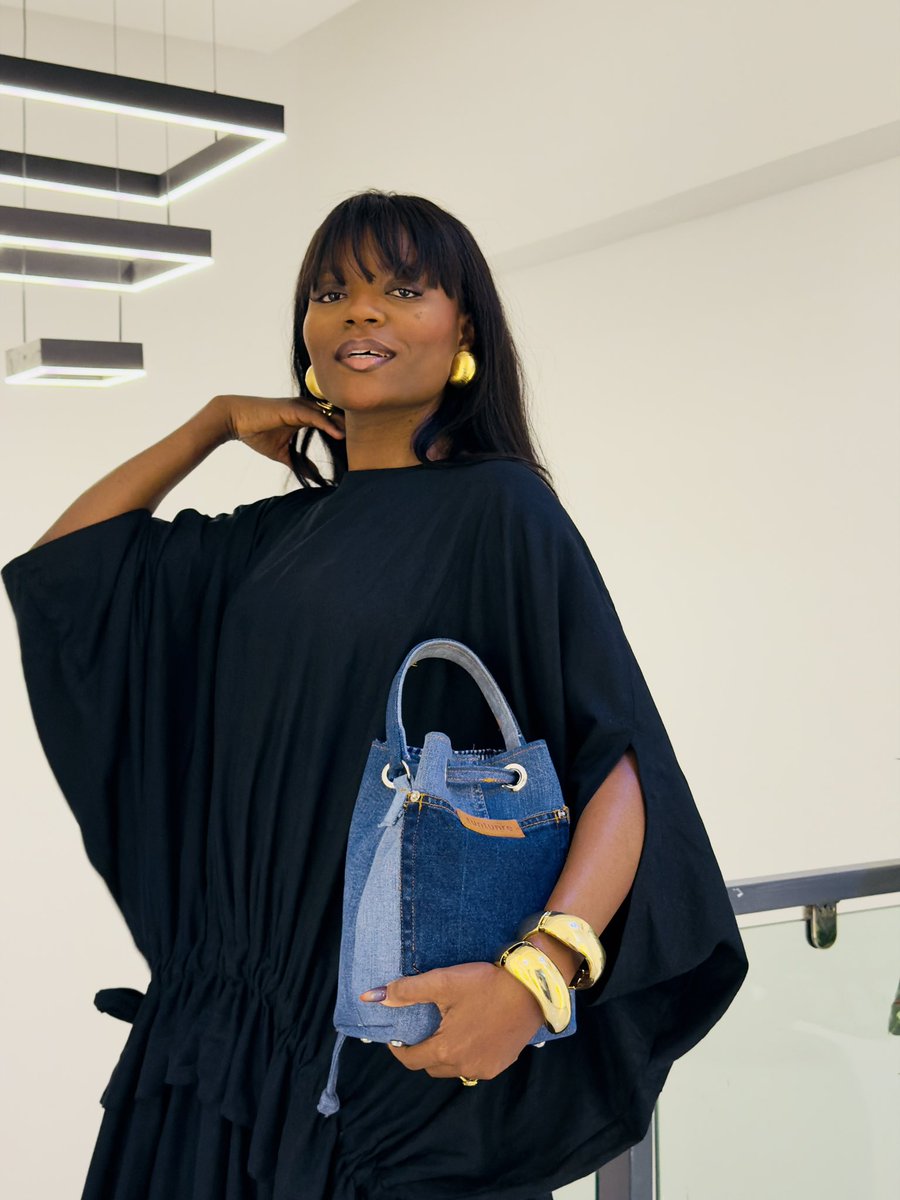 theglobaltemi's tweet photo. Few years ago, I’d just finished a panel with the world bank in Egypt. On my way and out, the head of LAWMA said “I think you should go into recycling”. Well, today, I founded https://t.co/GA0ZQ1ZNv8, where we upcycle used jeans into bags. I’m carrying one. Happy recycling day! https://t.co/U8a47GaYw1