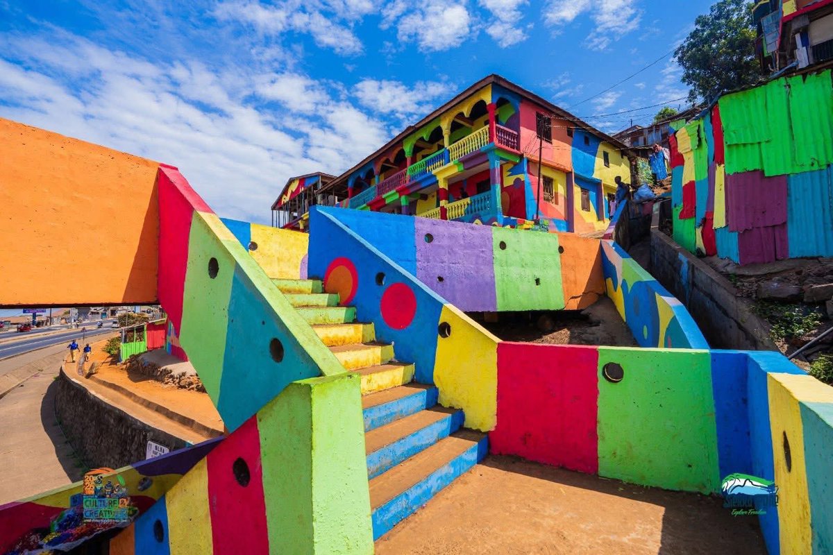ChernorMomoh01's tweet photo. The Rainbow City, located along the Hillside Bypass Road in eastern Freetown, has been unveiled as a vibrant symbol of Sierra Leone’s culture, creativity, and community pride by the Ministry of Tourism &amp; Cultural Affairs SL @Mtcasierraleone.
#VisitSierraLeone #ExploreSalone https://t.co/WFypf5UbUH