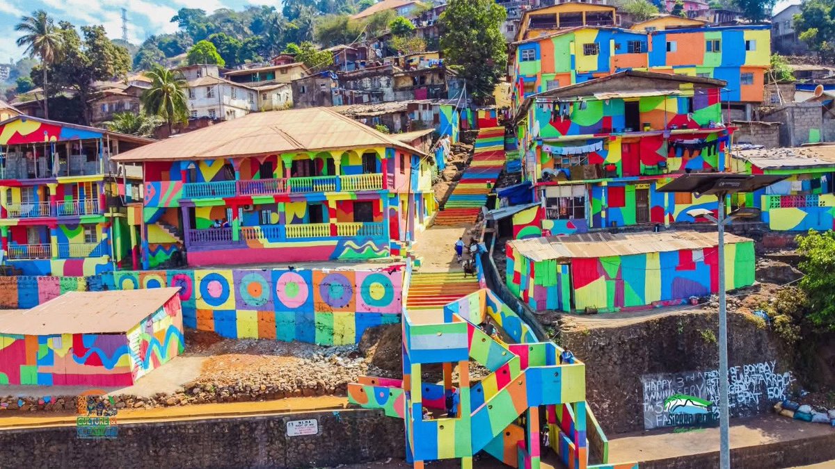 ChernorMomoh01's tweet photo. The Rainbow City, located along the Hillside Bypass Road in eastern Freetown, has been unveiled as a vibrant symbol of Sierra Leone’s culture, creativity, and community pride by the Ministry of Tourism &amp; Cultural Affairs SL @Mtcasierraleone.
#VisitSierraLeone #ExploreSalone https://t.co/WFypf5UbUH