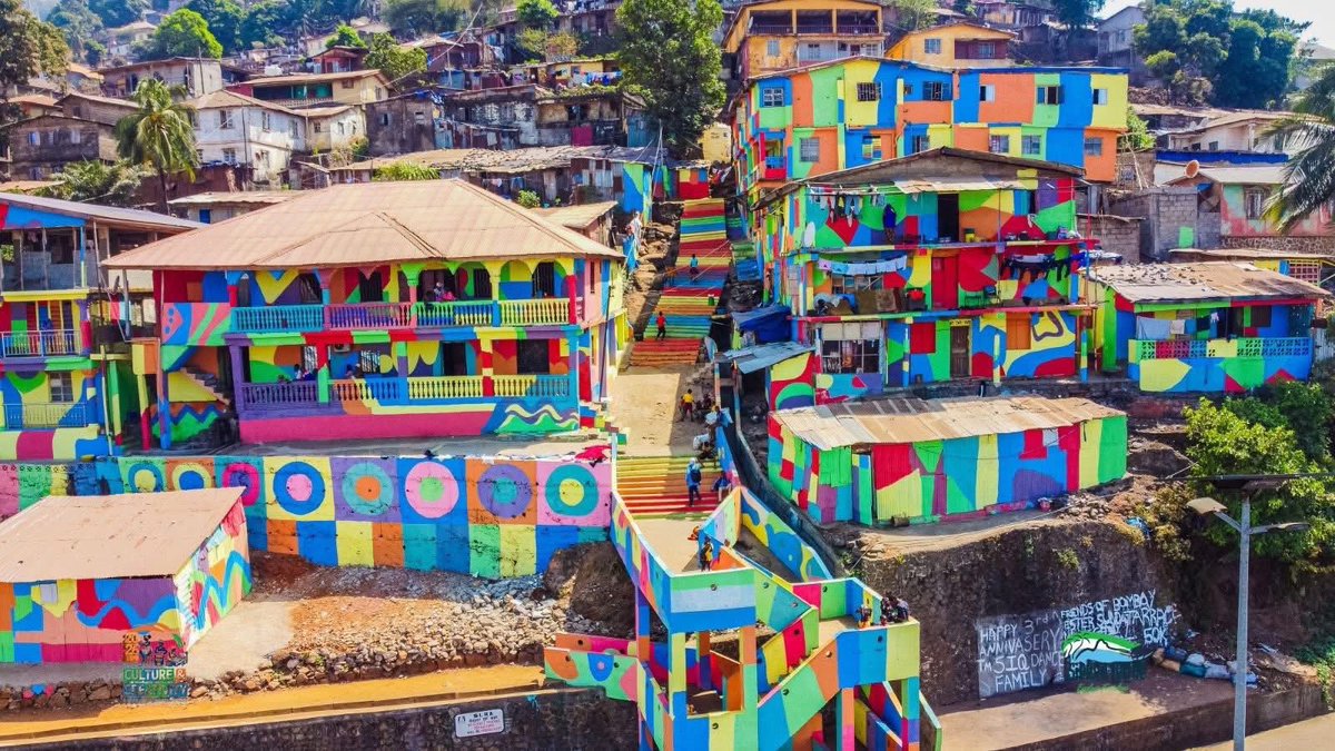 ChernorMomoh01's tweet photo. The Rainbow City, located along the Hillside Bypass Road in eastern Freetown, has been unveiled as a vibrant symbol of Sierra Leone’s culture, creativity, and community pride by the Ministry of Tourism &amp; Cultural Affairs SL @Mtcasierraleone.
#VisitSierraLeone #ExploreSalone https://t.co/WFypf5UbUH
