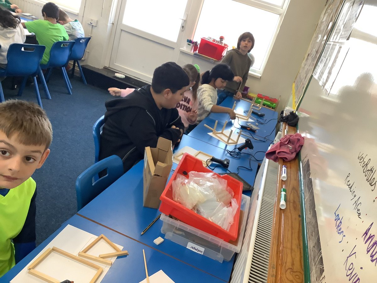 AbbeyPrimary's tweet image. At the hot glue gun station, #Y4 have been glueing their wooden frames and using cam wheels and dowel to create a wheel and axle mechanism to attach to their Roman Chariots #DT