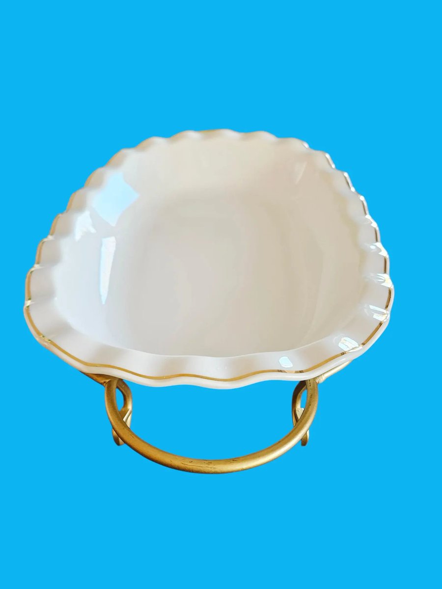 80014au's tweet photo. Vintage Bali White Ceramic Scalloped Serving Dish with Gold Metal Scroll Stand 14"  https://t.co/qiRyI5yVTW #vintageservingdish #retrobowl #vintagedinnerware https://t.co/P9eptu4eqZ