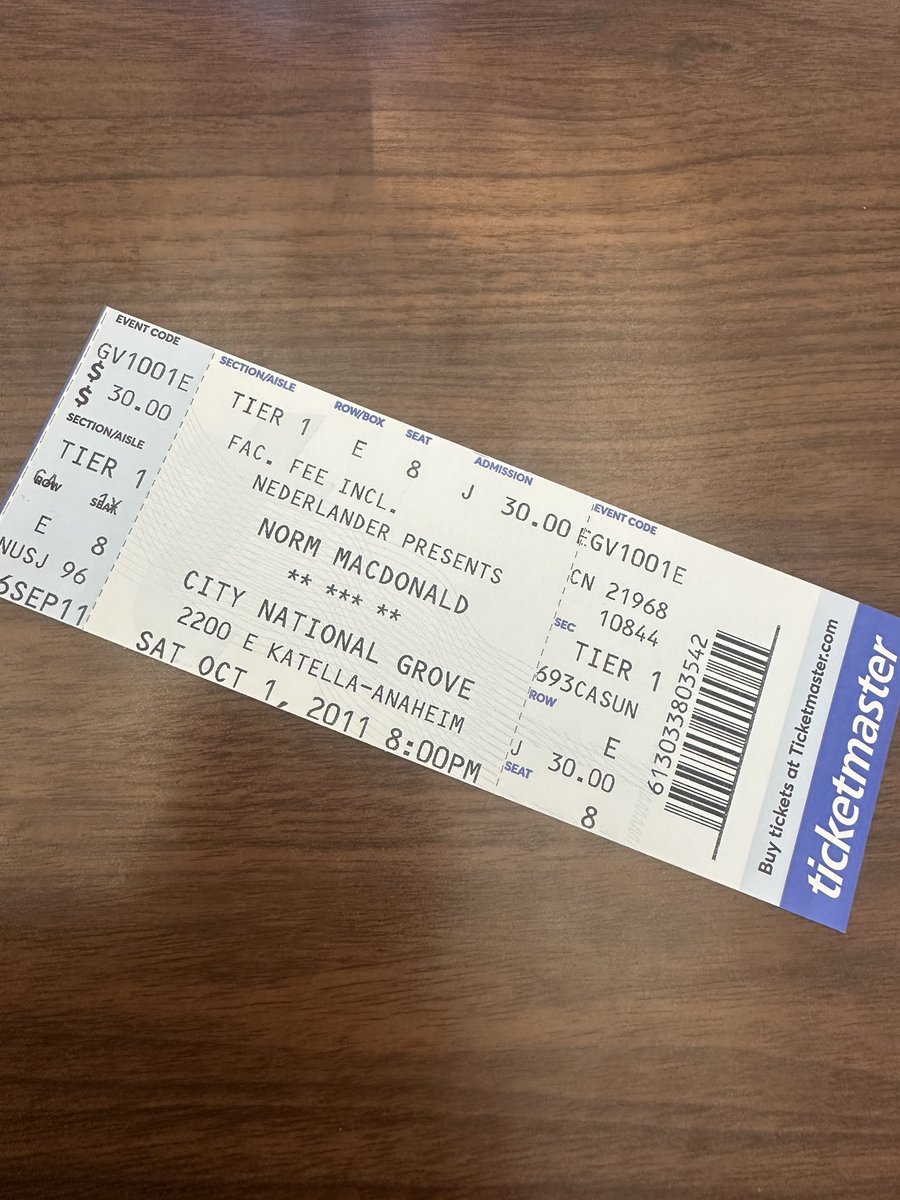 astaire99's tweet photo. My ticket printer had a slight malfunction and started spitting out tickets. They were all for the show I was working on except for this one for Norm McDonald in Anaheim in 2011. Could Norm be my Box Office Spirit Guide? I accept! @normmacdonald https://t.co/5WbxoHwGW9
