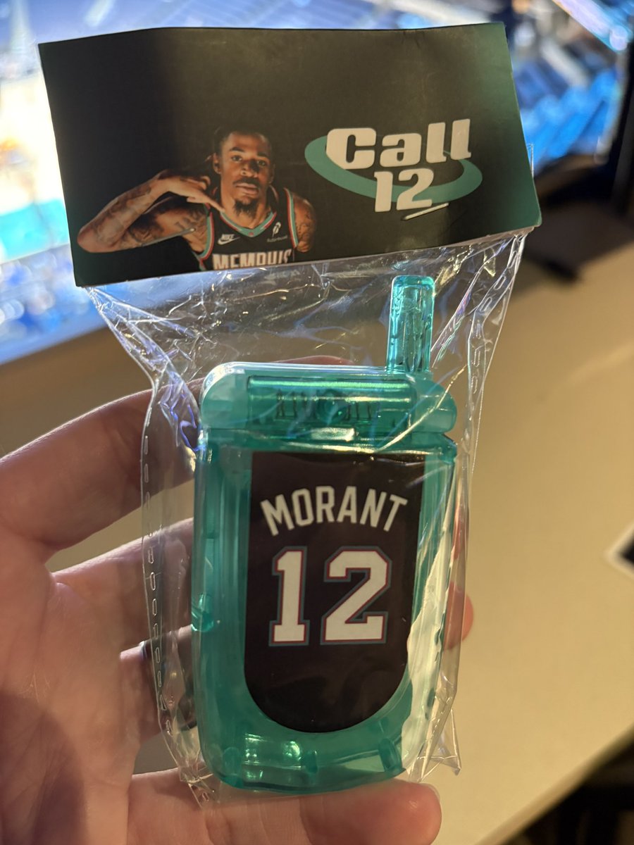 DraftKings's tweet photo. The Grizzlies might have one of the best fan giveaways ever with the Ja Morant 'Call 12' phone for tonight's game 📞🤳

(📷: @fastbreakbreak) https://t.co/nv2cz75ncl