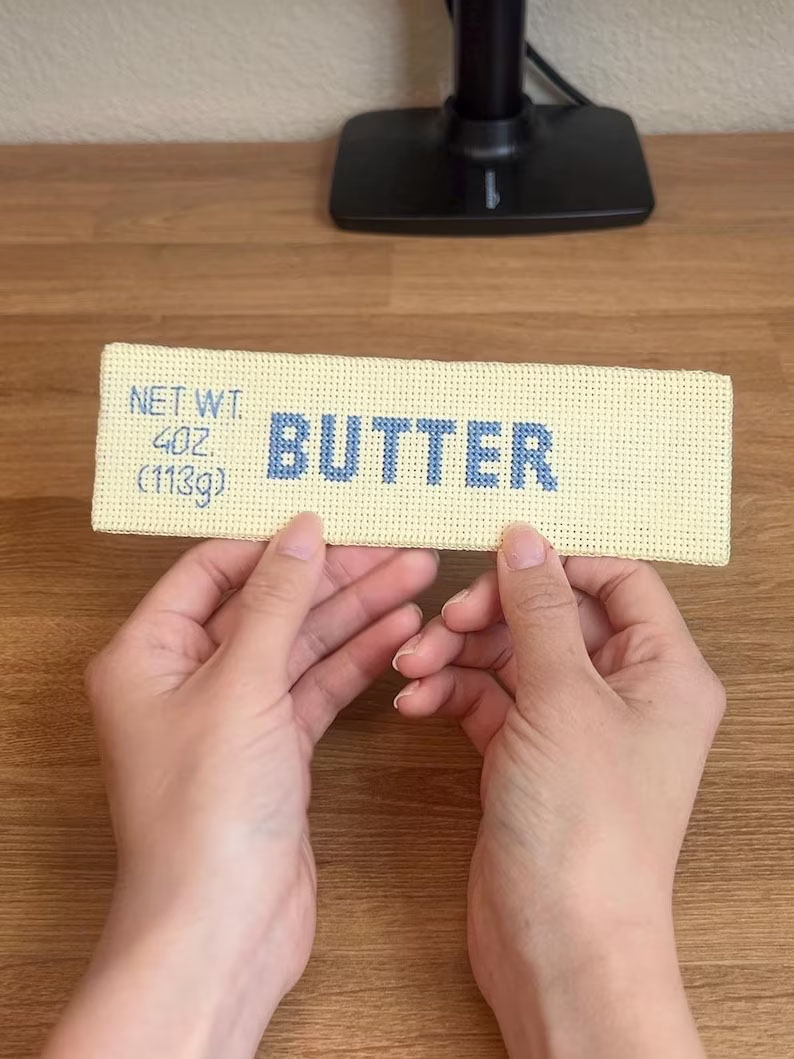 SueBEdwards's tweet image. I saw this on an Etsy ad and had to look it up.  PandaMaoShop offers a pattern for a two-sided stick of butter counted cross stitch bookmark.  And into my cart it goes.  
#booklover #crafter #author