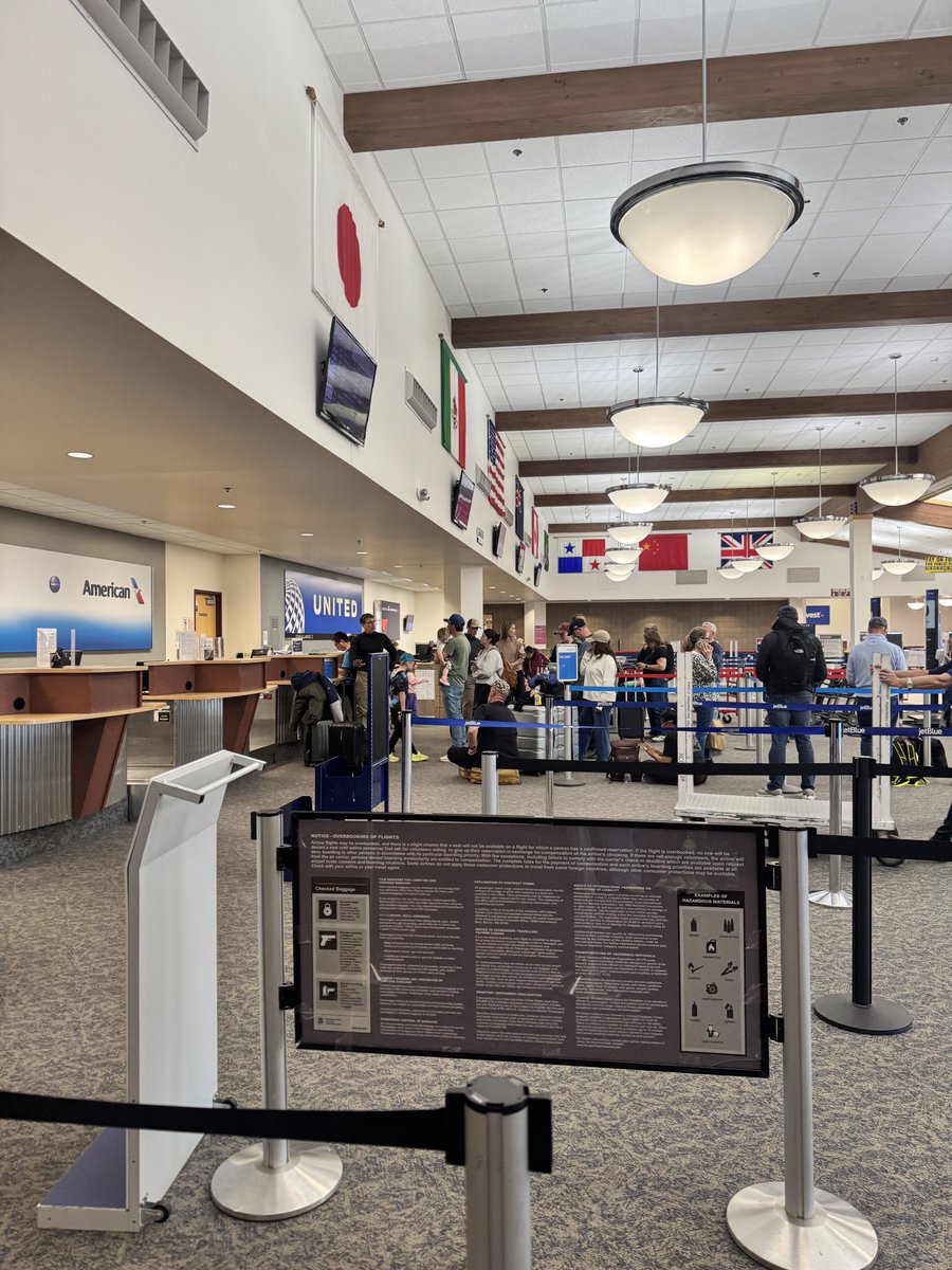 albur0714's tweet photo. @AmericanAir Two flights cancelled due to poor planning for staffing by American, we’ve boarded and off boarded a flight, rechecked bags, gone through security twice, and now the agents have abandoned everyone waiting in line at the desk for an hour without any updates. #HDN https://t.co/jGkrSFyRL4