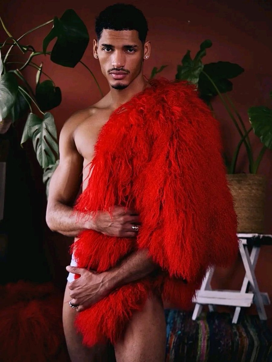 Wrapped in red, dripping in confidence.