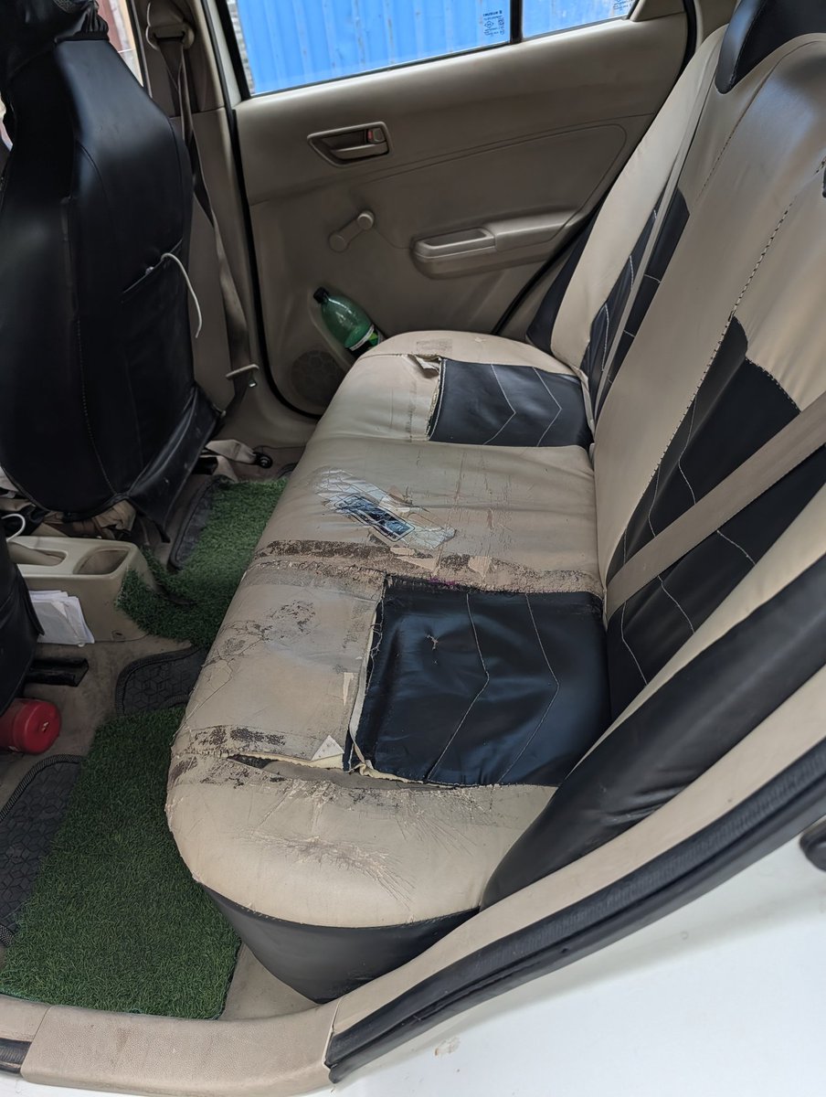 naveen_doc's tweet photo. @UberIN_Support @Uber this car with completely tattered seats came under Uber Premier today. Had to ask the driver to cancel. Is there any quality standard you have - at all? https://t.co/ZpnQvuH7VH