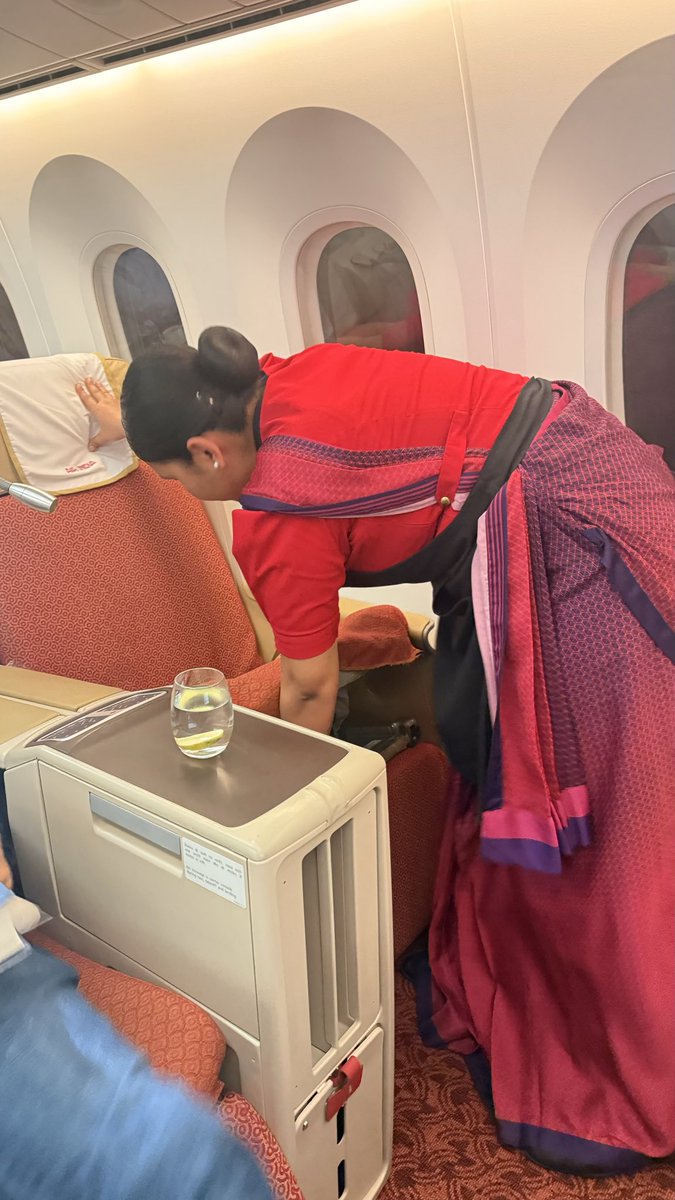 designbait's tweet photo. @airindia when you travel #BUSINESSCLASS and crew has to manually pull out seat. #Inconvenient. Light not working. Bell not working, screen not working. Hard misaligned seat, maladjusted cushion, slipping off seat! horrible in-flight experience. #refund my #money Flight #AI2665 https://t.co/n8LygHv03k
