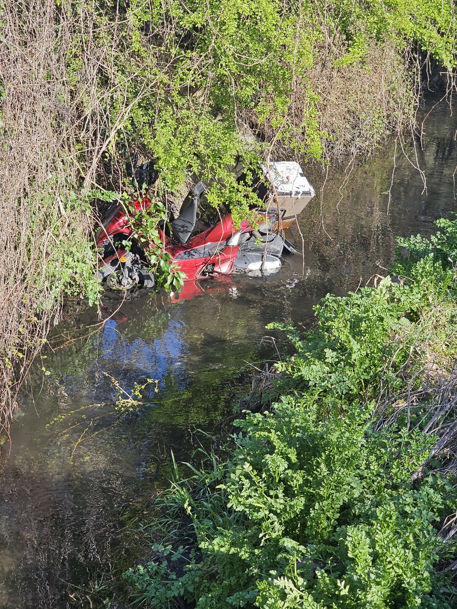 v_danner's tweet photo. @SloughCouncil another big dump this time in the brook by the bridge of Windsor Meadows Park in cippenham. Looks like the scooter was stolen, broken into and dumped. This is getting ridiculous! https://t.co/9jngRWi37m