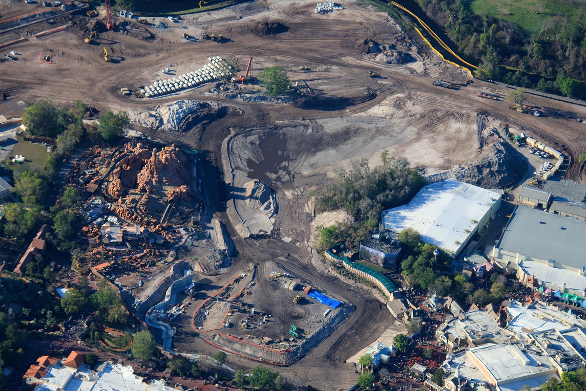 Aerial overview of site preparation for Piston Peak National Park and for Villain's land at Magic Kingdom.