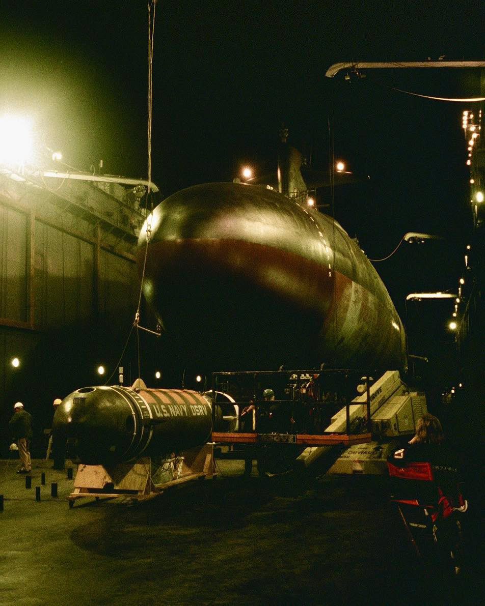 Boneyardsafari's tweet photo. Here is a look behind the scenes of the movie, The Hunt for Red October. Set lights illuminate the USS Permit SSN-594 in dry dock during the filming of the movie. #huntforredoctober #usspermit #ssn594 #boneyardsafari #navalsafari https://t.co/DYN3NTe97W