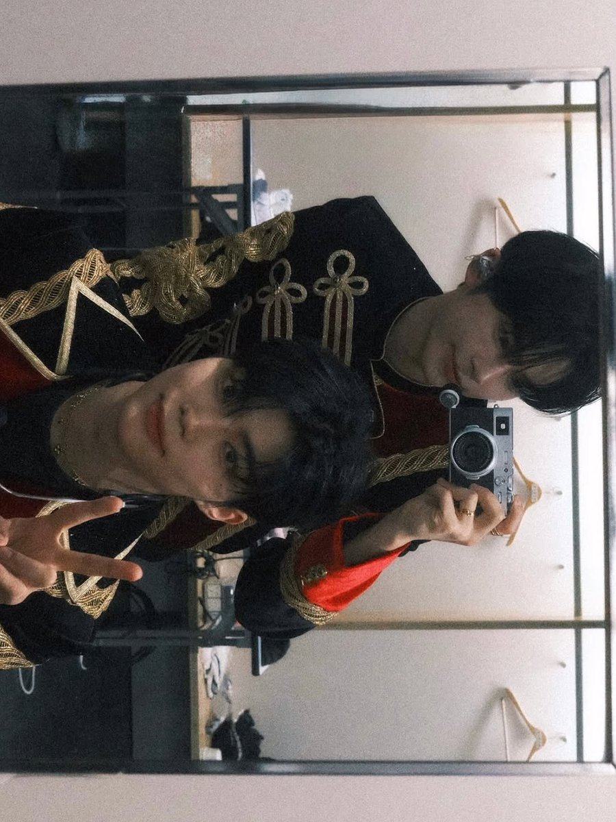 I found a quiet corner outside and simply sat there for a while, letting the cool air settle softly around me. The costume felt heavier than usual, but in the best way possible, like wearing something that truly meant something deep inside.