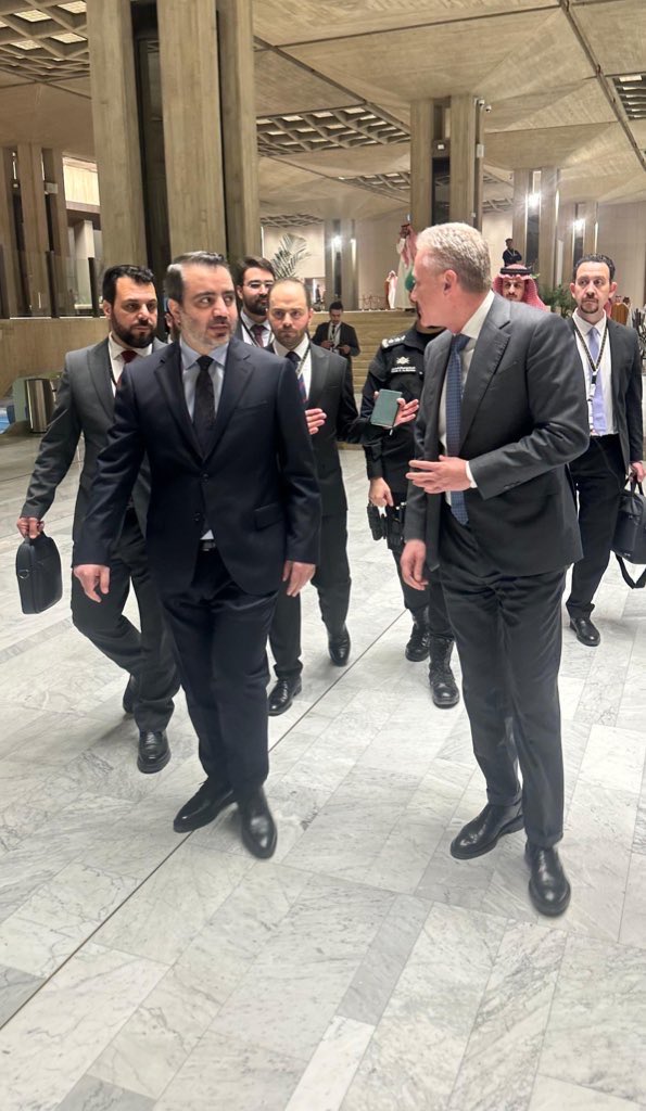 YoussefRaggi's tweet photo. On the sidelines of my participation in the emergency consultative meeting held in Riyadh, I had a side conversation with the Syrian Minister of Foreign Affairs @AsaadHShaibani. He confirmed to me that the deployment of Syrian forces along the border with Lebanon is solely intended to protect Syrian territory and to secure the border against any security breaches or smuggling. He stressed that Syria does not intend to enter Lebanon or interfere in its internal affairs in any way.