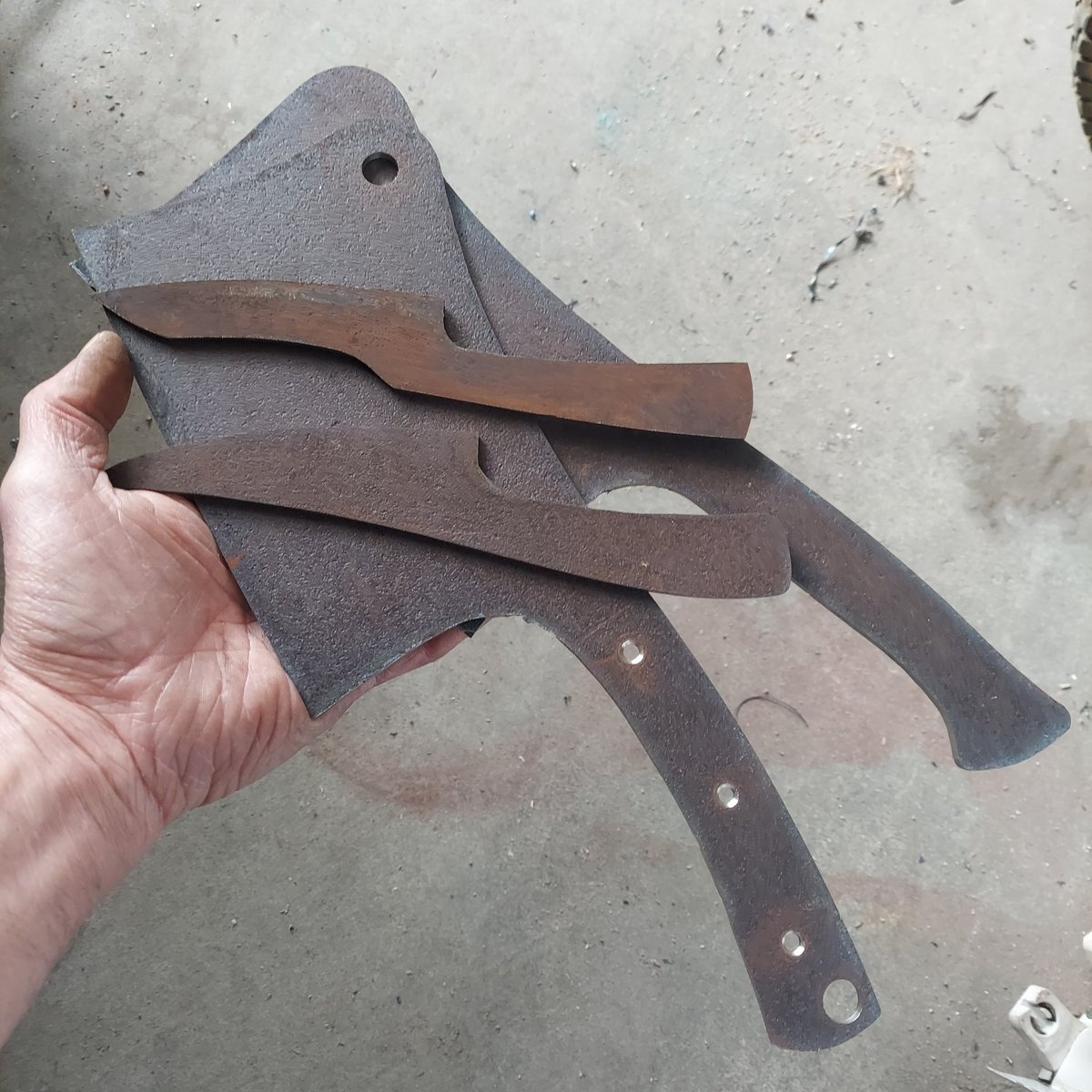 Upcoming work.  I'm diving into uncharted territory by working on some clevers.  Steel used is an old large buzzsaw blade.