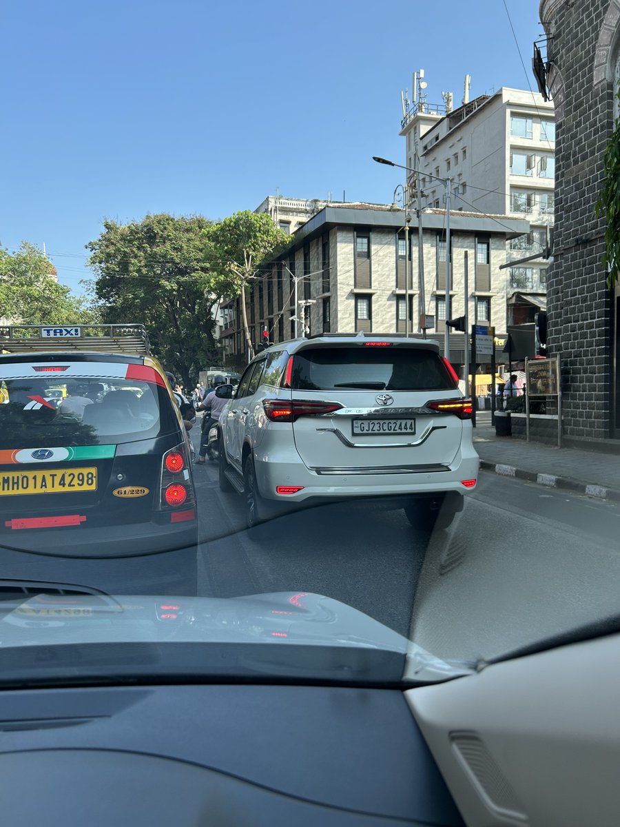 ComplaintBoxBom's tweet photo. @MTPHereToHelp @RoadsOfMumbai @mumbaimatterz @MumbaiPolice 
Car Number: GJ23CG2444
Colaba at electric house this car cuts a long line down the wrong side of the road. Will anything ever be done? Nothing in our country will change unless you clamp down on laws. https://t.co/V0YobBYR5q