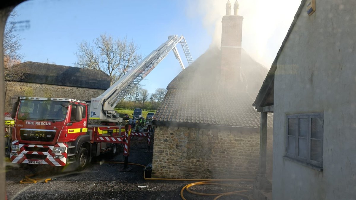 DWFireRescue's tweet photo. We’ve been dealing with a thatch fire on Chedington Lane, #Mosterton since this afternoon alongside colleagues from @DSFireUpdates. Good progress is being made but there will be a significant fire presence for sometime yet. Please avoid the area. https://t.co/PGd0ZINxu8