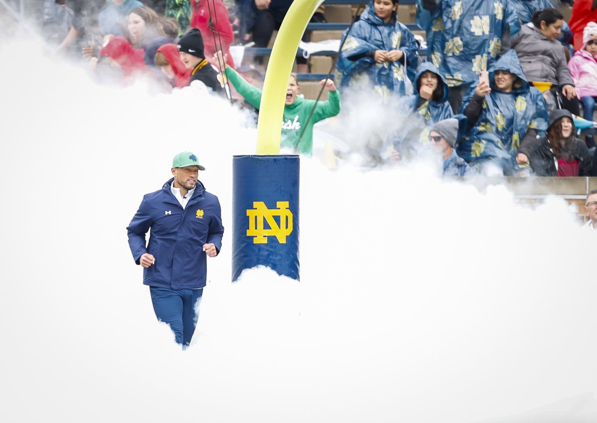 Judgephil1's tweet photo. @NDFootball, it’s never just about winning. Yesterday, @Marcus_Freeman1 reminded everyone why. Because, “God, Country, Notre Dame” isn’t just a phrase inscribed on the Basilica—it’s who he is.☘️  read it: https://t.co/Odw4CE7okR https://t.co/xEeREBfpi8