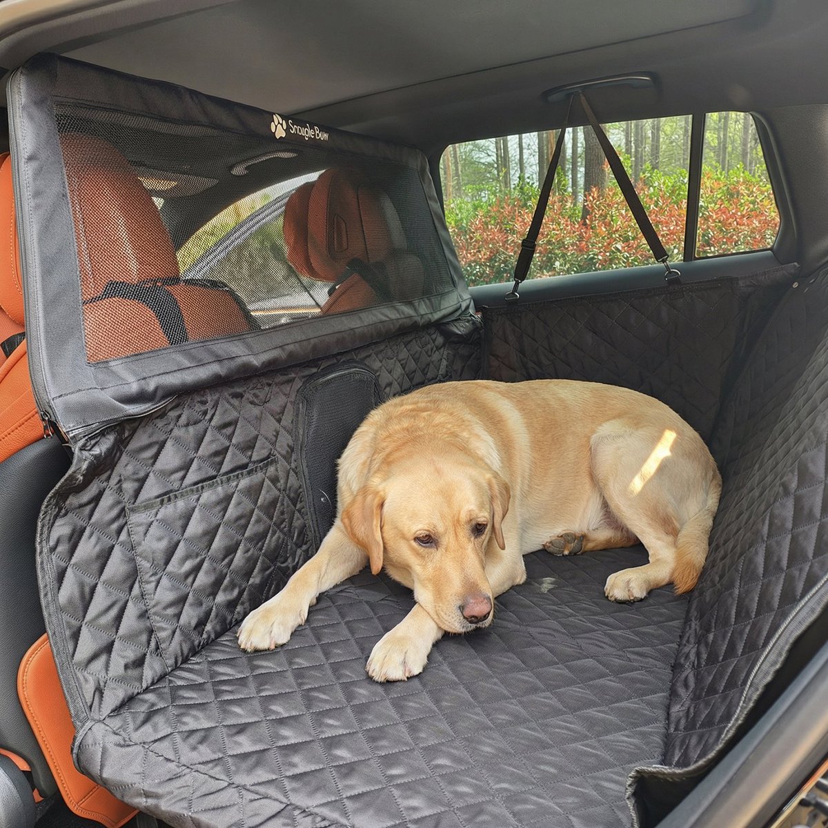 SnaglePaw's tweet image. Stop the "front seat FOMO"! 🐾 Our patented 31" ultra-high barrier keeps your pup safely in the back while the hard bottom provides 40% more room to stretch. No more sliding, no more distractions. Just safe, happy travels! 🚗💨#SnaglePaw #DogSafety #CarEssentials #PetTravel #dog