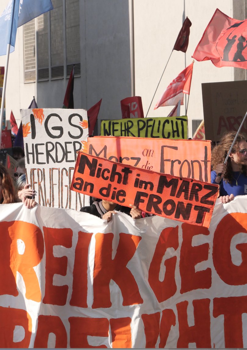 warresistersint's tweet photo. A new youth movement is taking shape in #Germany. Despite pressures and challenges, students are organising, resisting conscription, and building something bigger. Read Part 2 of Marah Frech's blog exploring student protests in Germany here: https://t.co/59COzE2TcQ https://t.co/87oJ1Zy5s3