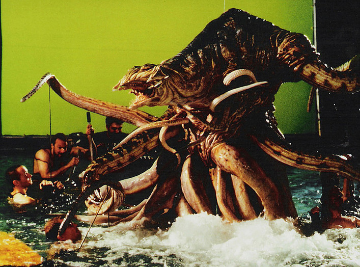 KNB Efx's quarter scale alien queen puppet, filming a climactic scene for 'The Faculty' (1998). Design by Bernie Wrightson.