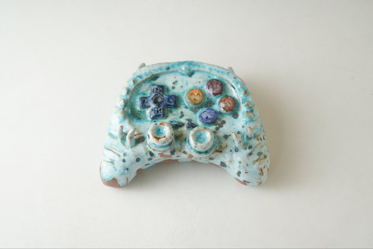 ゲームコントローラーと仏教の金剛杵は向こう側にアクセスするという