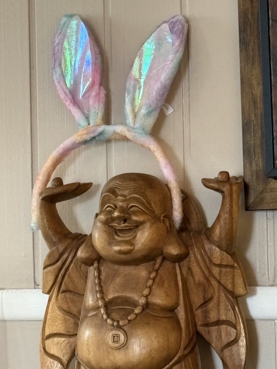Easter bunny ears on the Buddha at my chiropractor’s office 😆