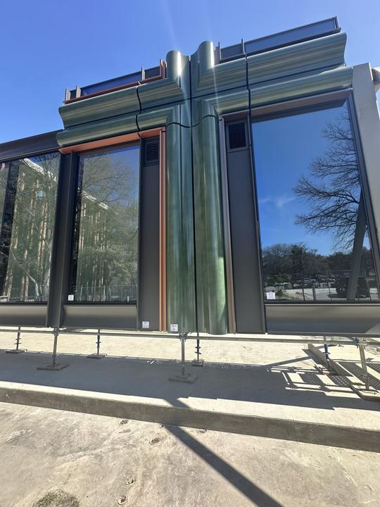 TheATX1's tweet photo. The facade mockups indicate that One Lady Bird Lake will be a green (as in color) building. https://t.co/mTNOiSWcqB