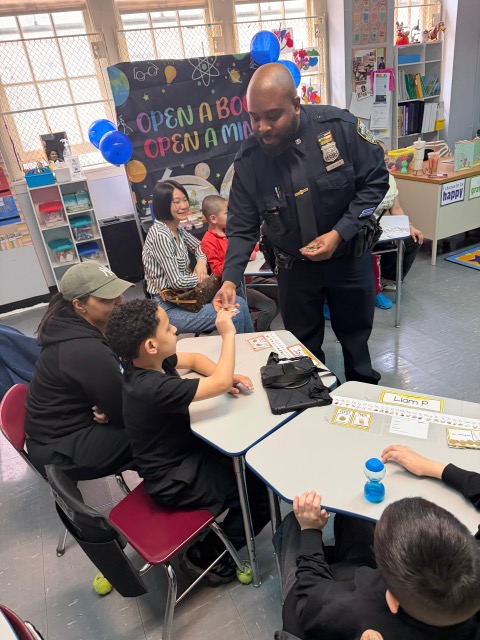 NYPD20Pct's tweet photo. Our 20th Precinct Youth Officers, PO Livingston &amp; PO Rodriguez, were guests at The Mickey Mantle School's "Mystery Reader Day" where they read to the kids, handed out gift bags, and swore them in as honorary police officers--badges and all! https://t.co/8GGLBlfM4b