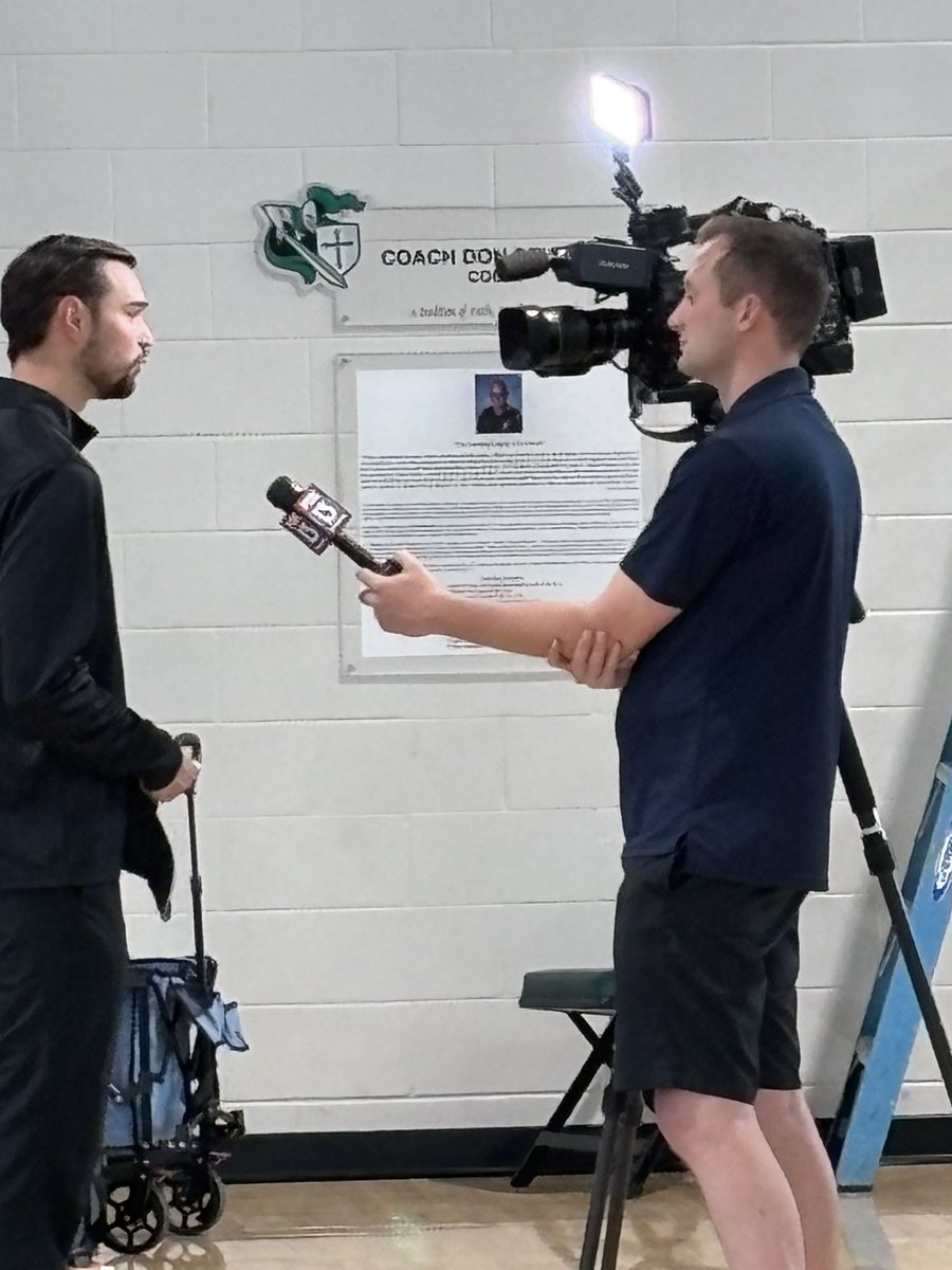 tampacathhoops's tweet photo. TC assistant Thomas Dziagwa being interviewed by Fox13 reporter Mark Skol for a Final 4 story. https://t.co/GxZNgznca9