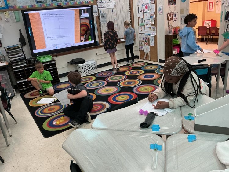 M19_MES's tweet photo. Mrs. Helf's second grade class at MES had fun practicing math with an egg hunt. #MESProud #19EveryStudent https://t.co/FadFlsBXlf