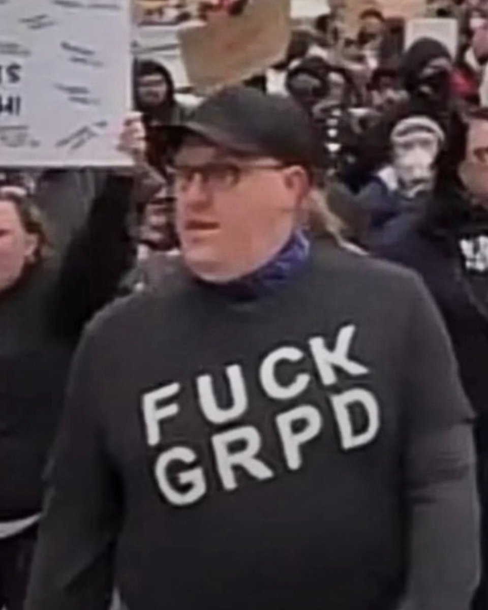 posthumus_bryan's tweet photo. This is Lucas Leverett. 

Lucas is a finalist to be appointed onto the Grand Rapid City Commission representing Ward 1. 

He’s now also known for wearing anti-cop T-Shirts in public.

GR should think very hard before giving a man like this authority over a police force — especially one that recently lost its chief because he was fed up with being hated.